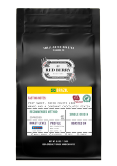 Black coffee bag with branding and product details on a white background